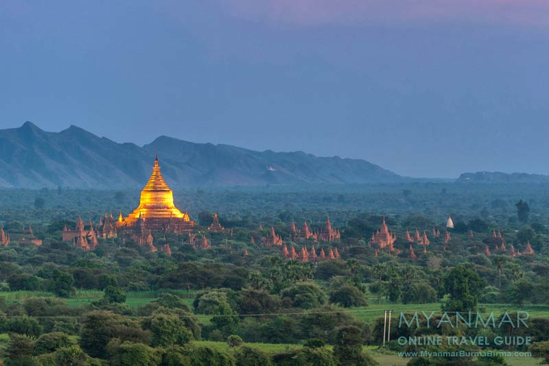 Die Dhammayangyi-Pagode in Bagan wird am Abend beleuchtet.
