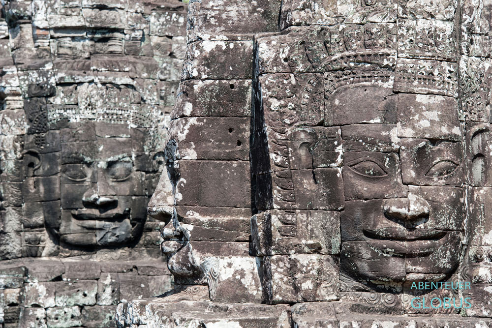 Steingesichter im Tempel Bayon, der zur Tempelstadt Angkor Thom gehört.