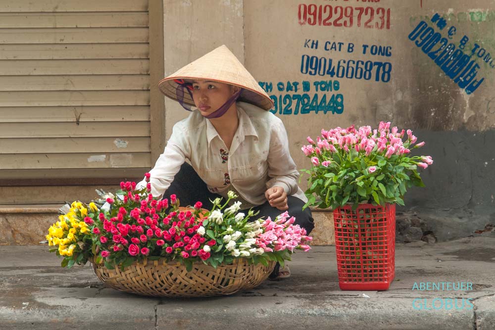 Blumenverkäuferin in der Altstadt
